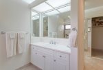 Guest bathroom with sink, shower and toilet
